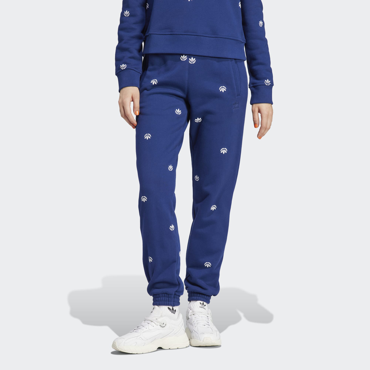 Buy Allover Mini Crest Logo Sweatpants - Blue Online in Saudi Arabia