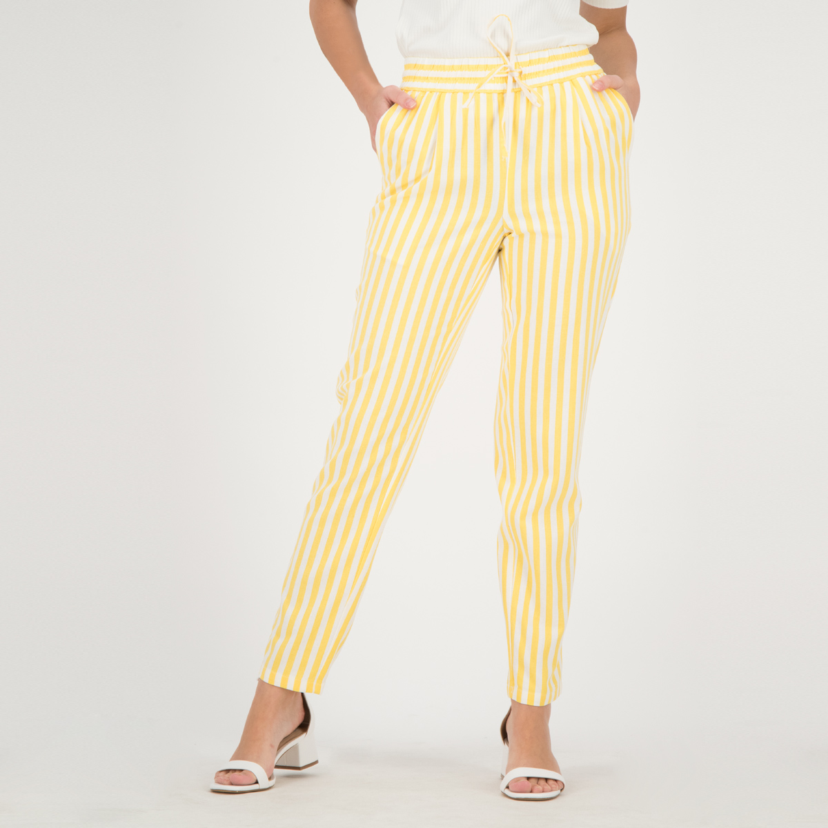 white and yellow striped pants